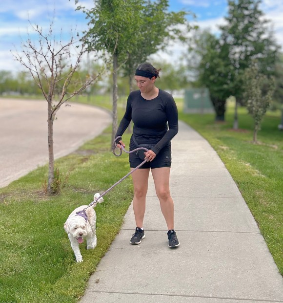 Dog wearing custom dog jogs shoes for outdoor running and exercise.