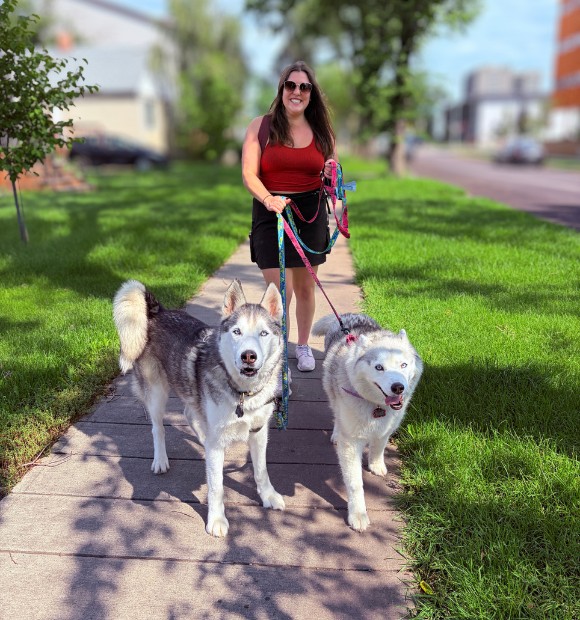 Dog wearing custom dog jogs shoes for outdoor running and exercise.